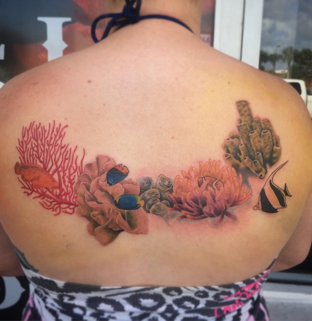 Colorful coral reef tattoo on the back Tattoo Design