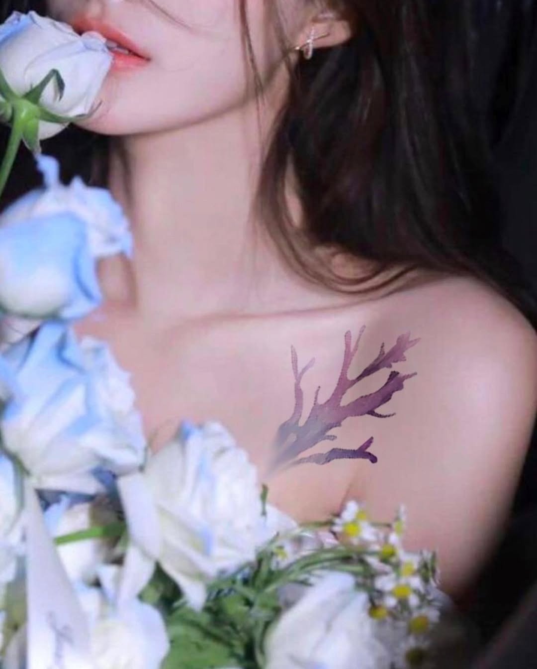 Delicate coral reef tattoo accented by roses Tattoo Design