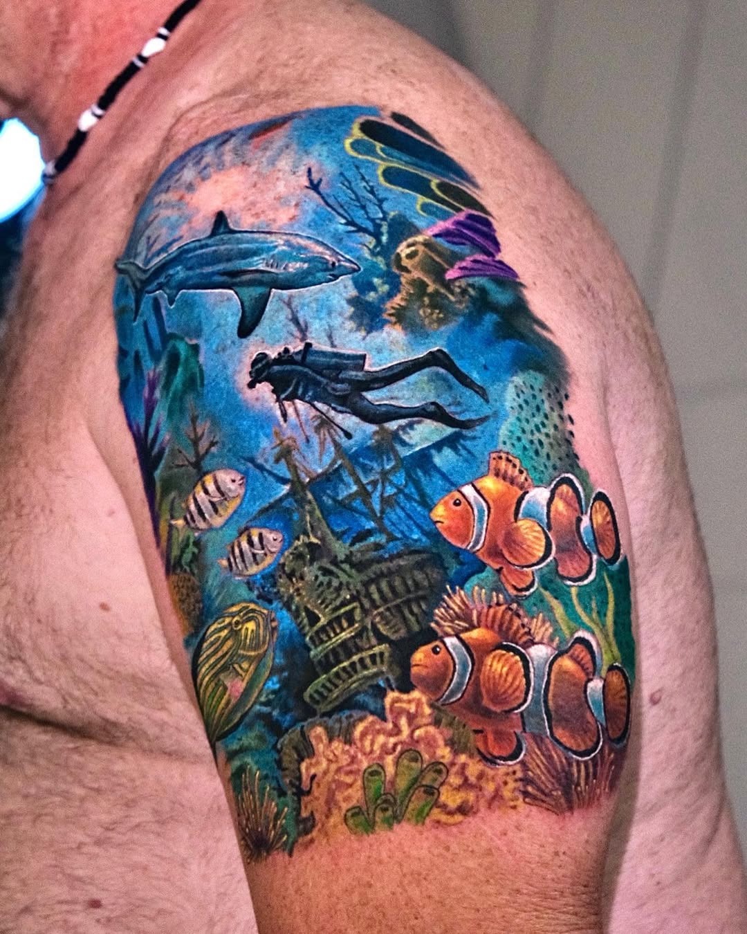 Stunning Coral Reef Tattoo with Diver and Fish Tattoo Design