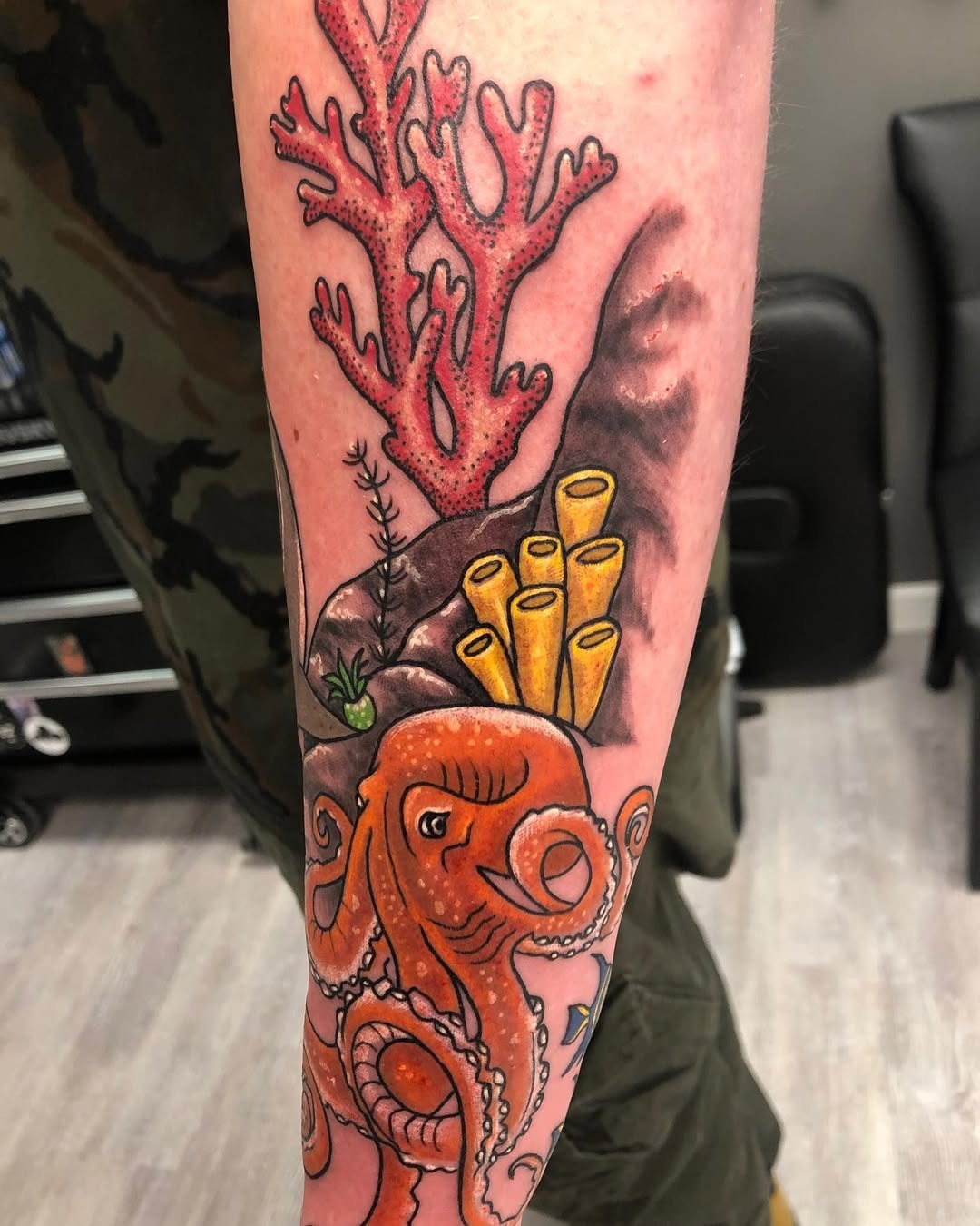 Vibrant Coral Reef Tattoo Featuring an Octopus Tattoo Design