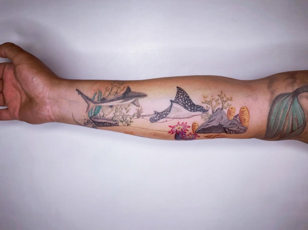 Vibrant coral reef tattoo with sharks and beauty Tattoo Design