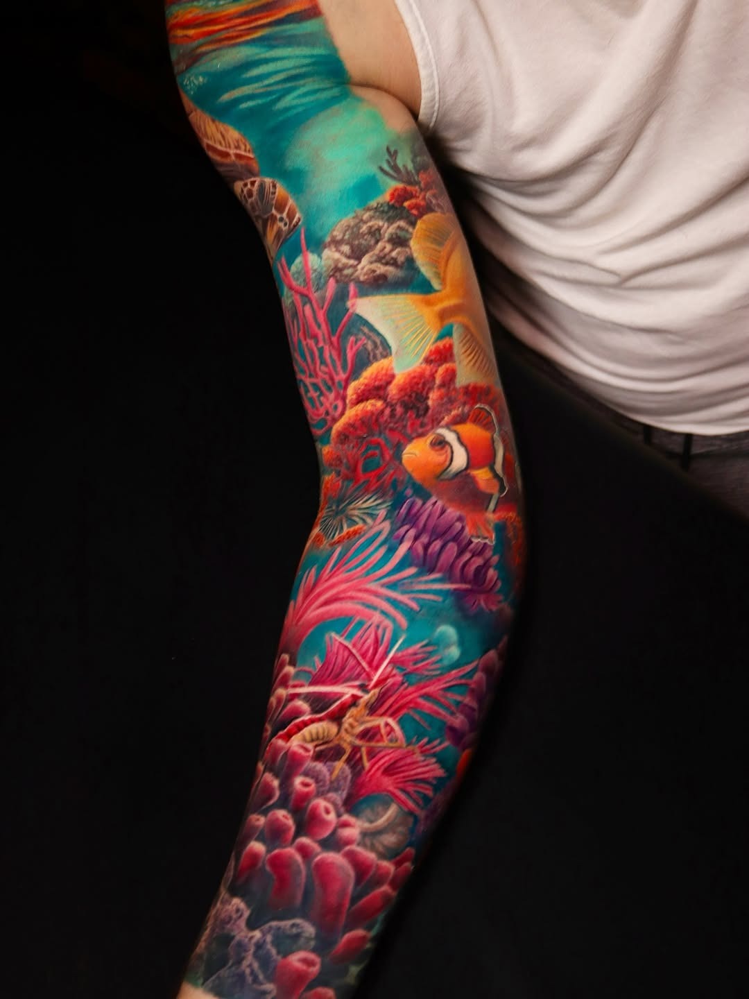 Vibrant coral reef tattoo with tropical elements Tattoo Design