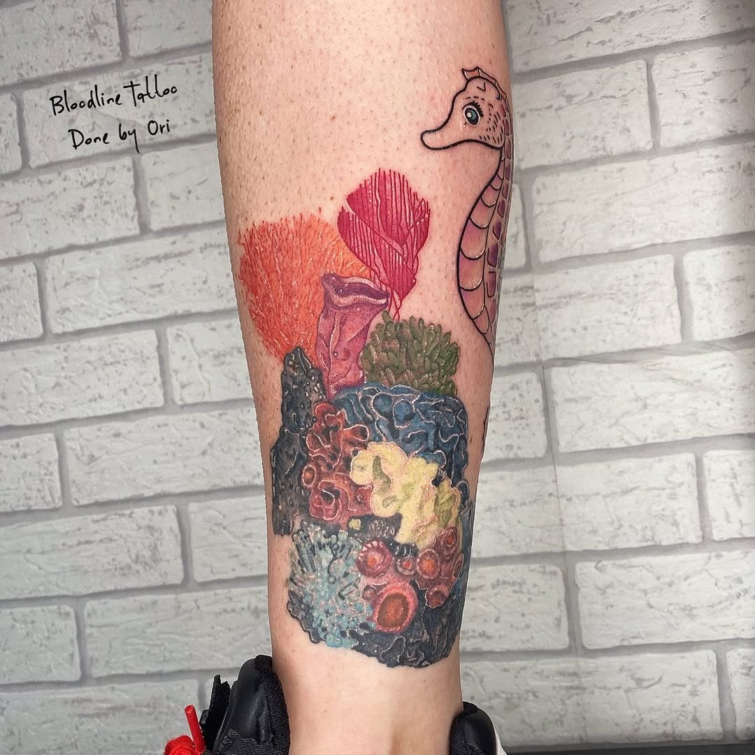 Vibrant seahorse and coral reef tattoo design Tattoo Design