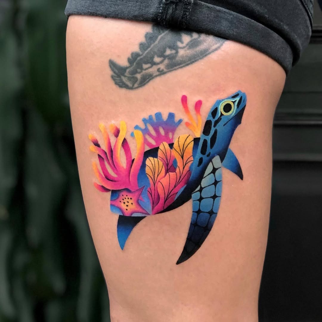 Vibrant turtle tattoo amid coral reef scene Tattoo Design