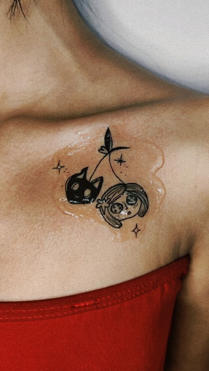 Coraline Doll-Inspired Color Tattoo Tattoo Design