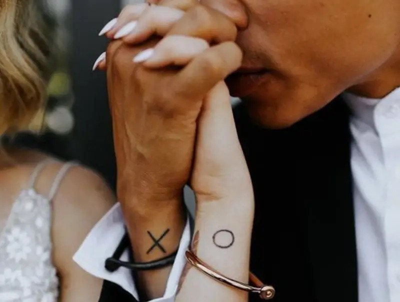 This tattoo design is a perfect example of how a simple, minimalist approach can convey profound meaning.