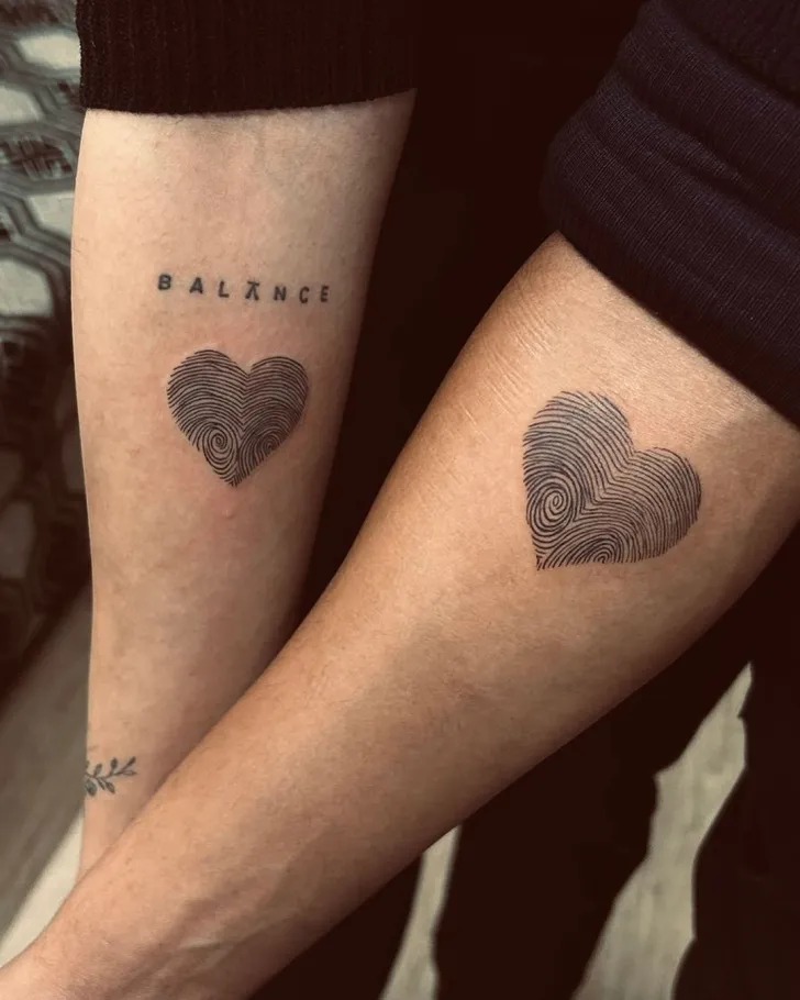 For couples who enjoy classic and straightforward symbols of their union, the "Mr." and "Mrs." finger tattoos are a perfect choice.