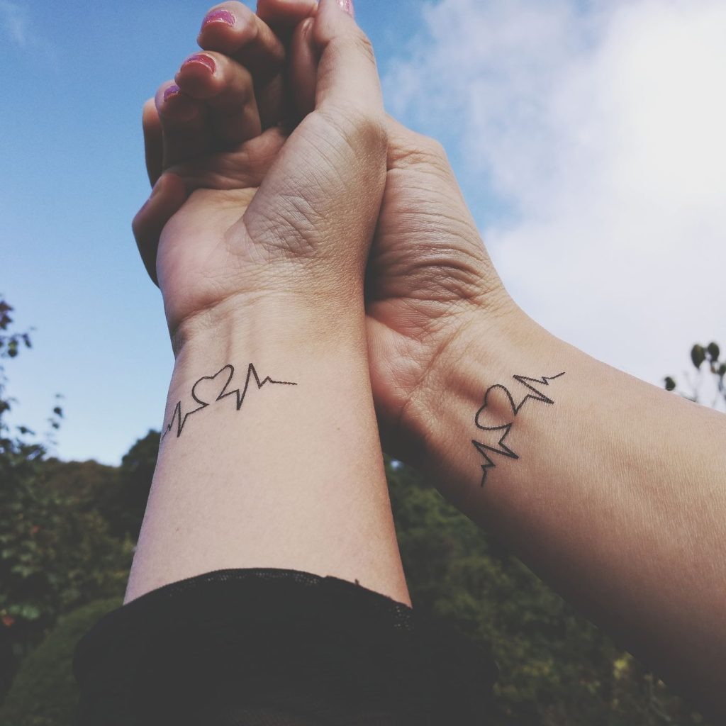 Heartbeat tattoos are a popular choice for couples, symbolizing the idea that their hearts beat as one.