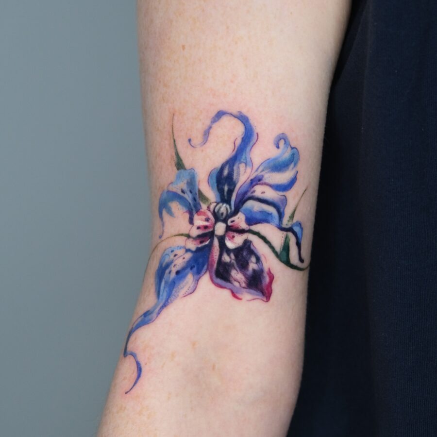 Beautiful floral cover up tattoo on arm Tattoo Design