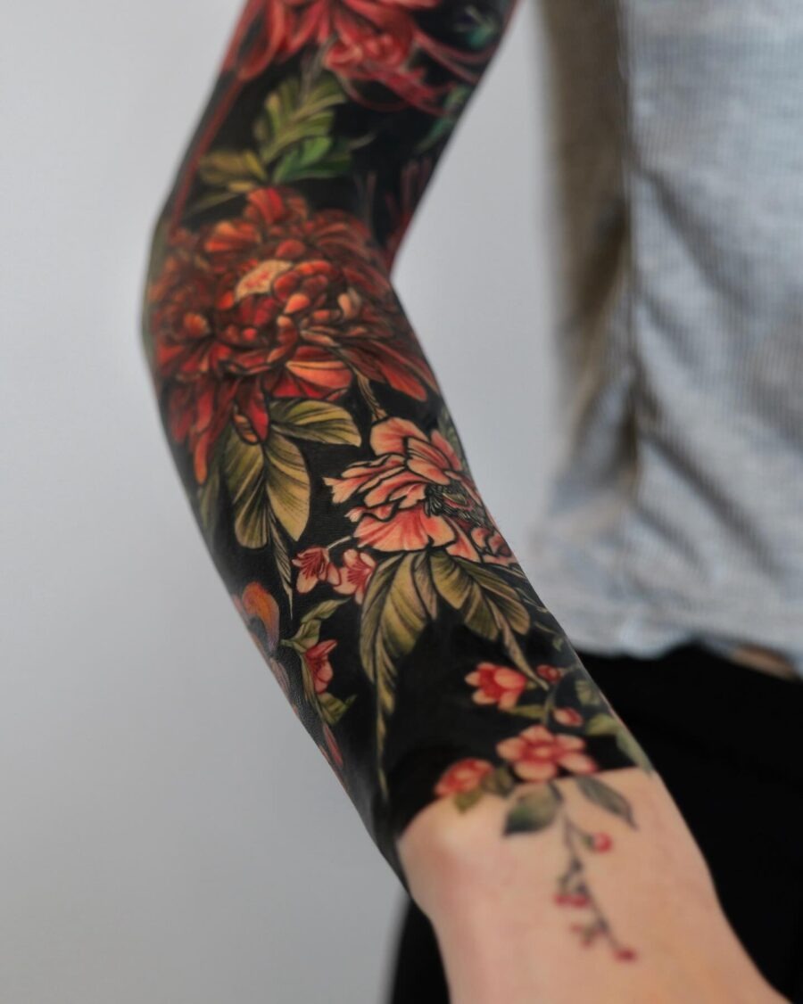 Beautiful floral cover-up tattoo on forearm Tattoo Design