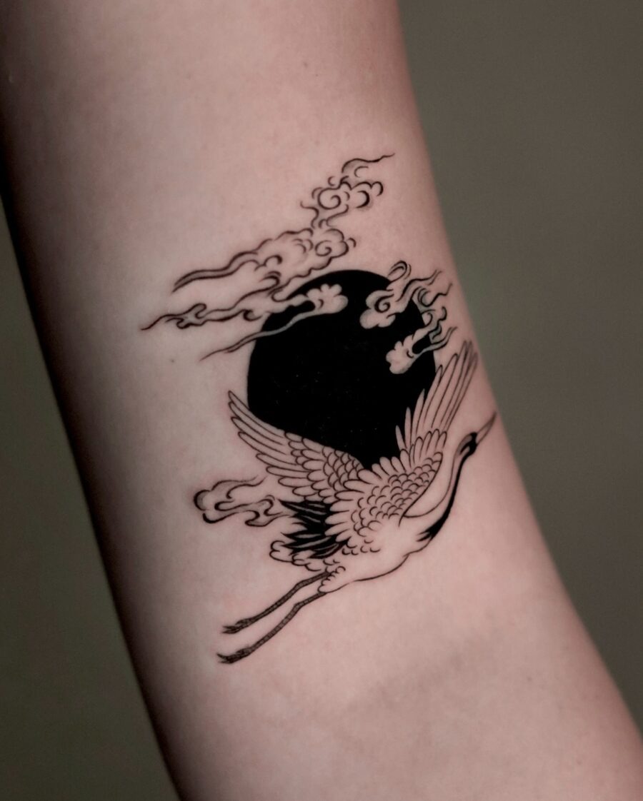 Elegant crane tattoo with clouds and moon Tattoo Design