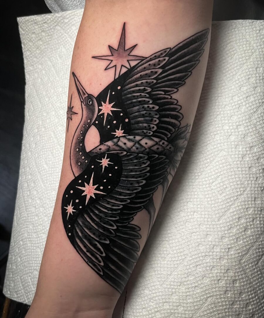 Elegant crane tattoo with cosmic elements Tattoo Design