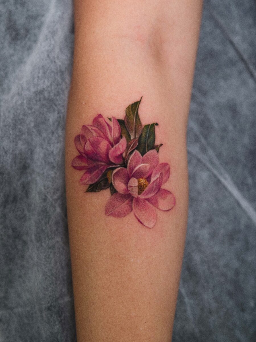 Elegant magnolia covers flaws beautifully Tattoo Design