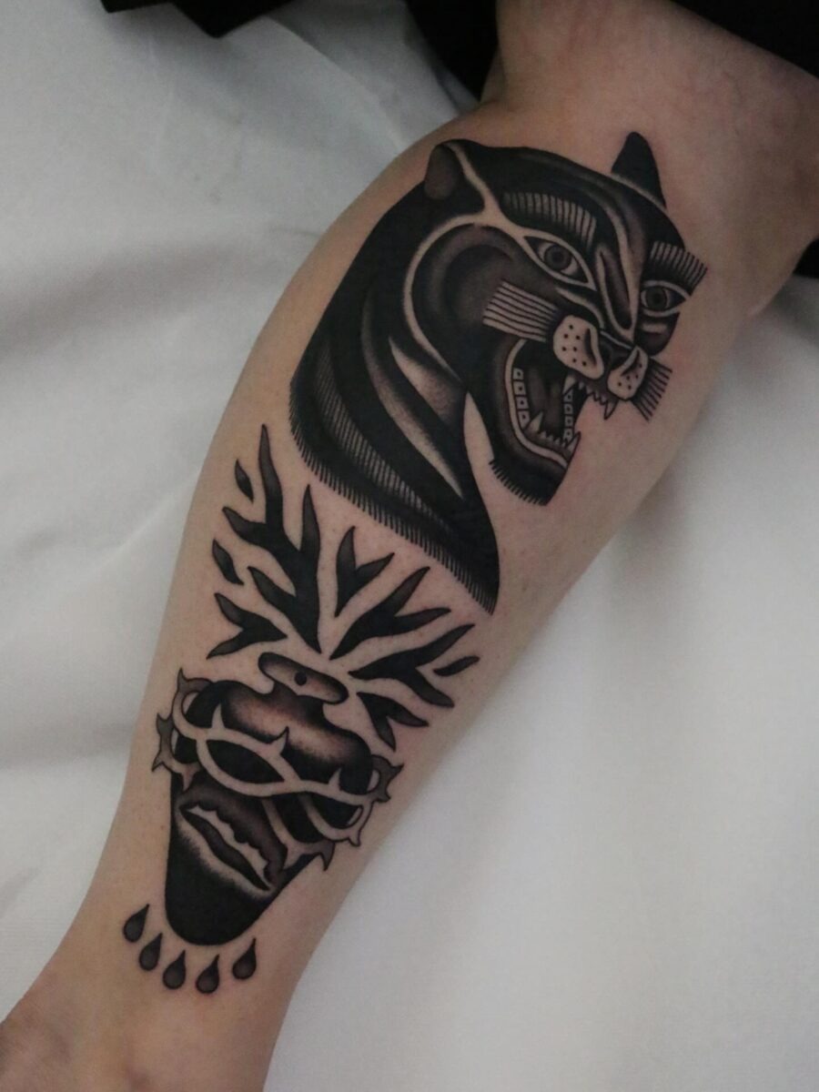 Striking black and gray animal tattoo design. Tattoo Design