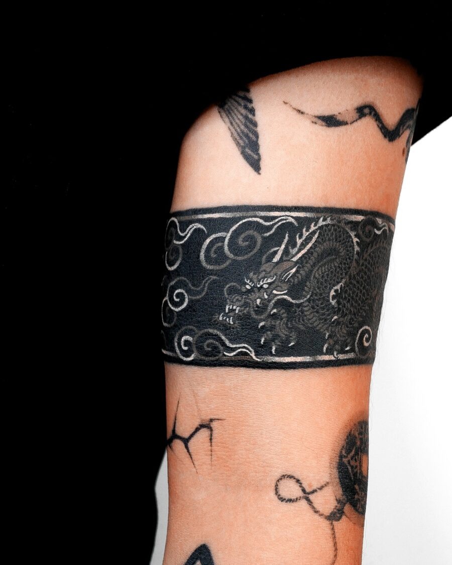 Stylish black ink dragon tattoo cover-up Tattoo Design