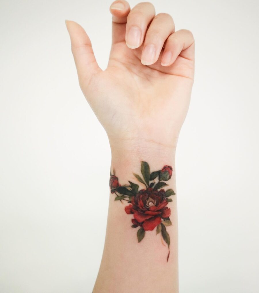 Vibrant floral wrist tattoo with intricate details Tattoo Design