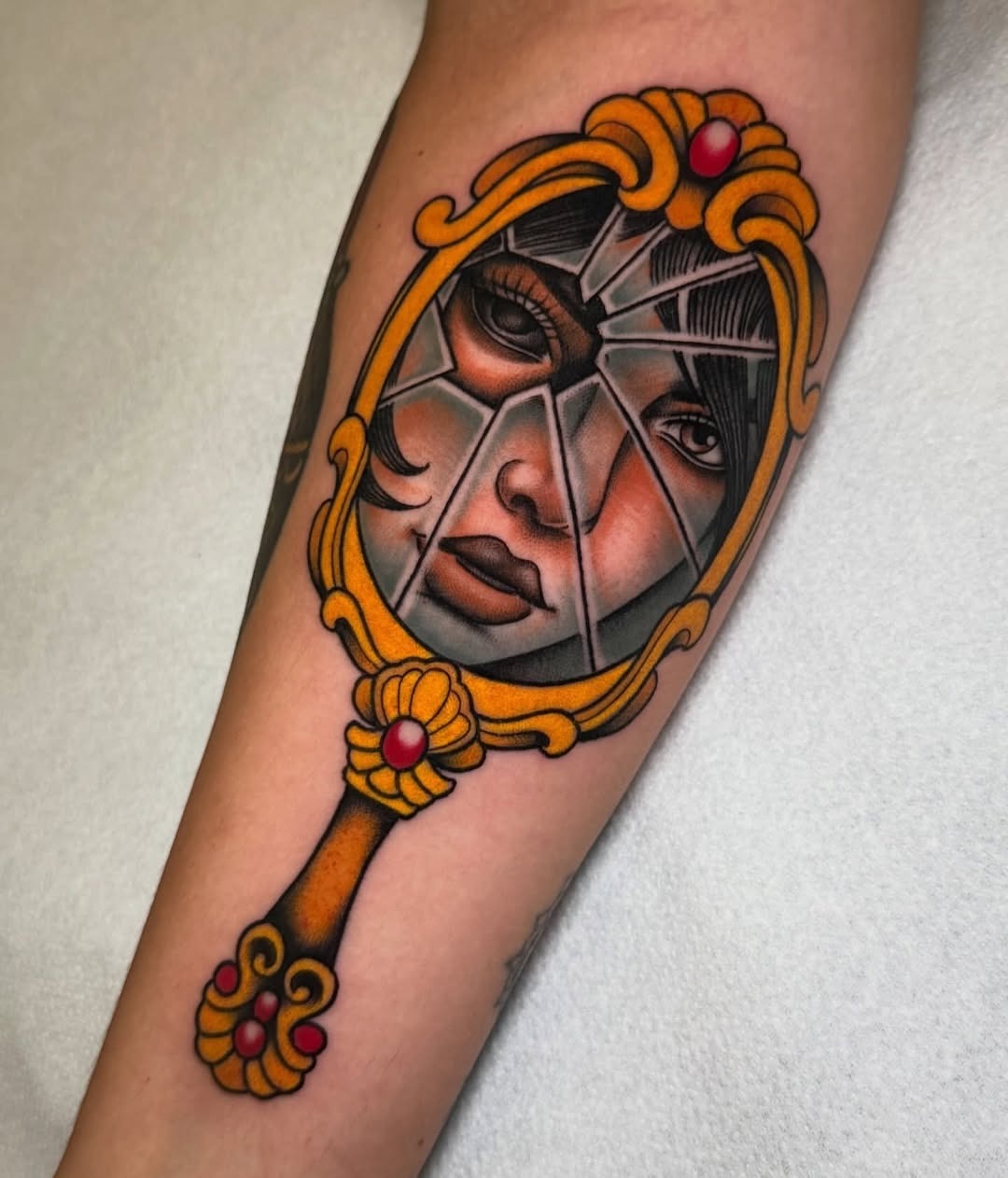 Artistic cracked mirror design with face reflection Tattoo Design