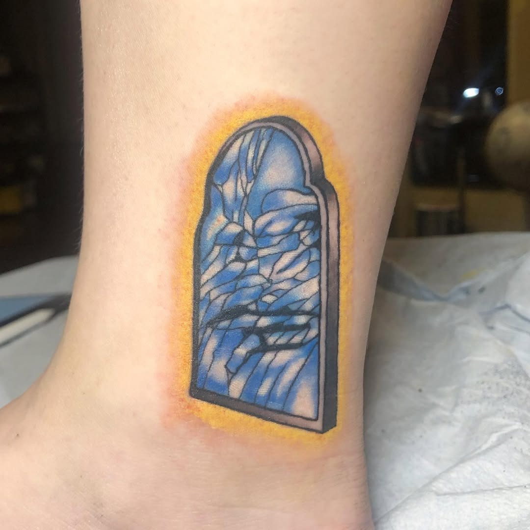 Eye-catching cracked mirror tattoo with vibrant colors Tattoo Design