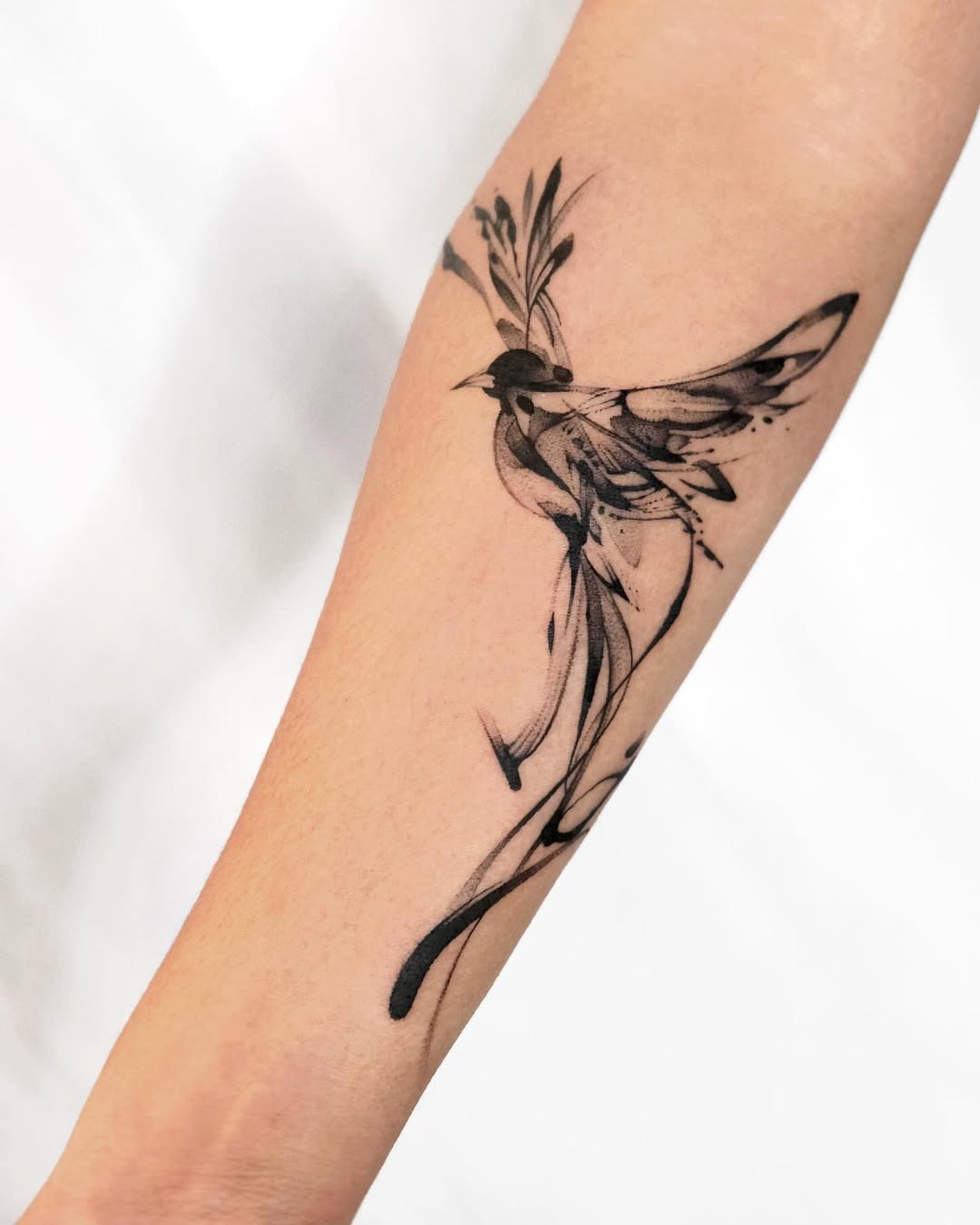 Elegant bird tattoo in mid-flight Tattoo Design