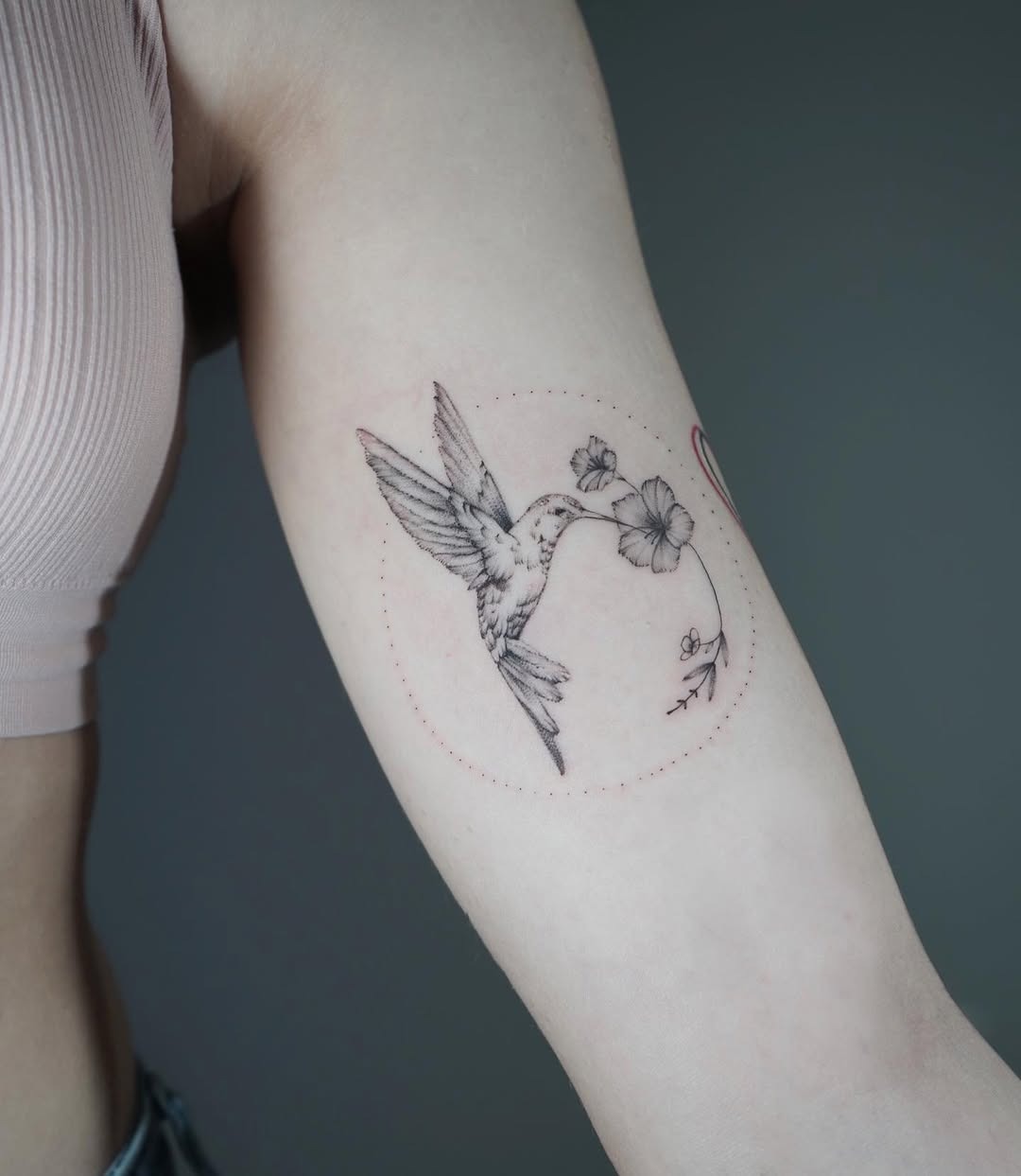 Elegant hummingbird with floral design tattoo Tattoo Design