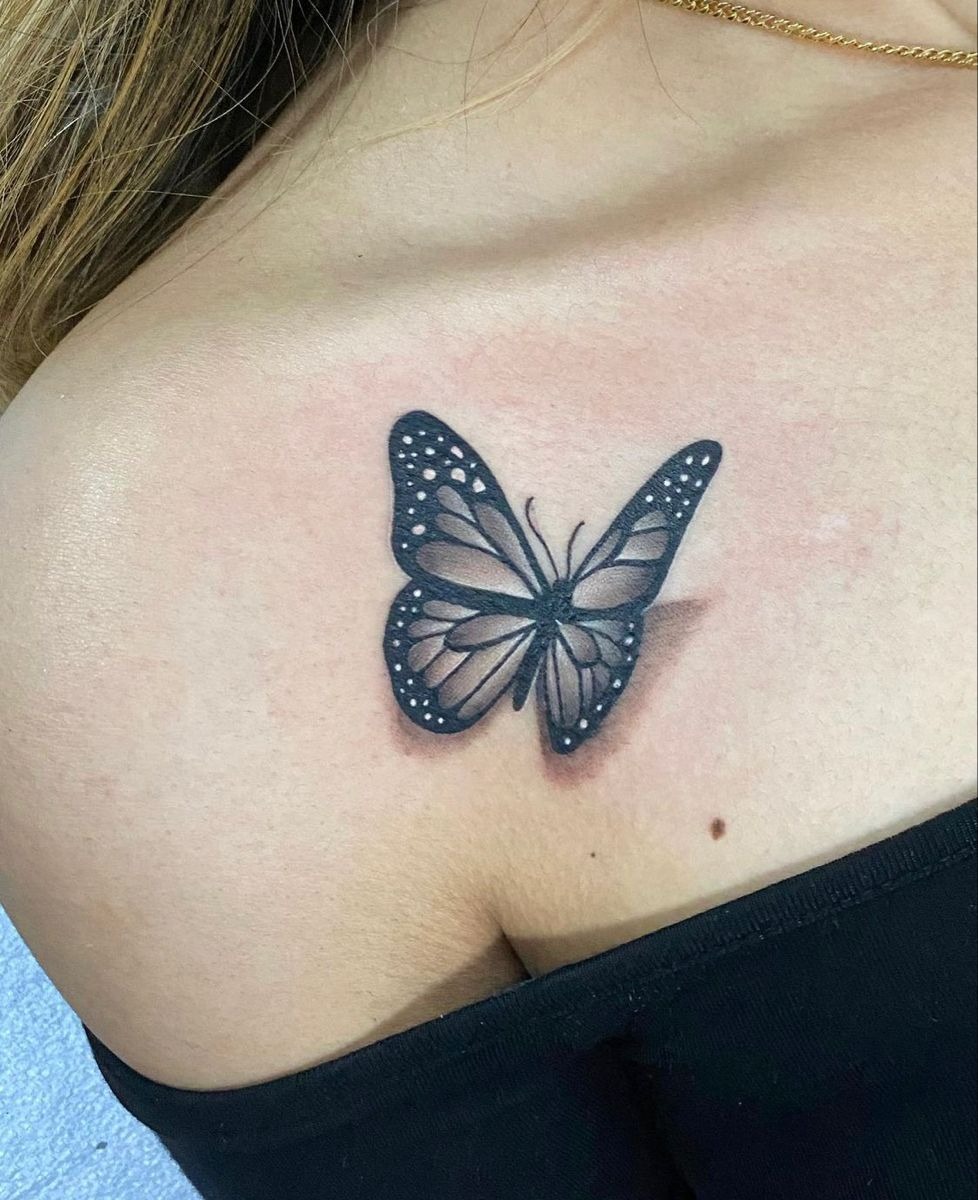 Black 3D Collarbone Butterfly Tattoo, a tattoo design rendered in delicate fine-line for the leg.