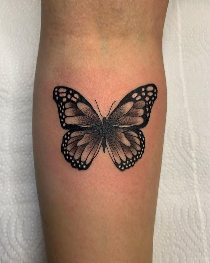 Classic Black Butterfly Tattoo, a tattoo design rendered in bold traditional.
