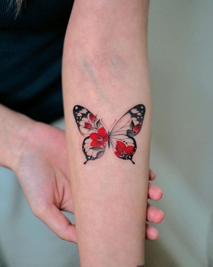 Floral Butterfly Forearm Tattoo, a tattoo design rendered in fine-line.