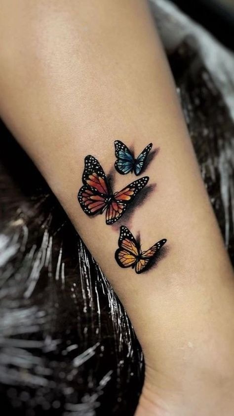 Mini Butterfly Trio Tattoo, a tattoo design rendered in delicate fine-line.