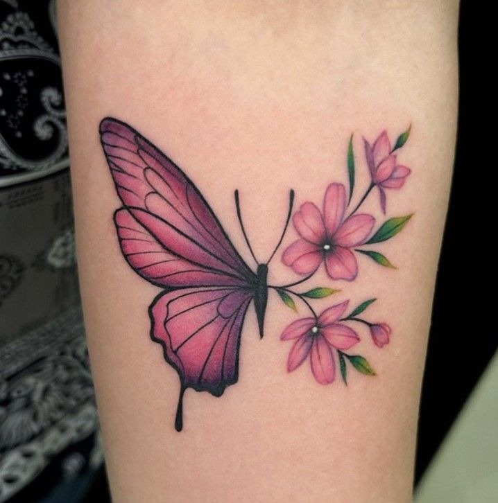 Pink Butterfly with Flowers Tattoo, a tattoo design rendered in delicate fine-line.