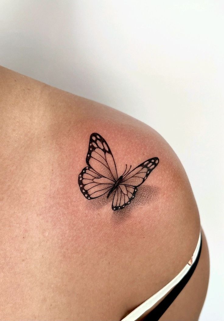 Soft Fine Line Butterfly Shoulder Tattoo, a tattoo design rendered in fine-line.