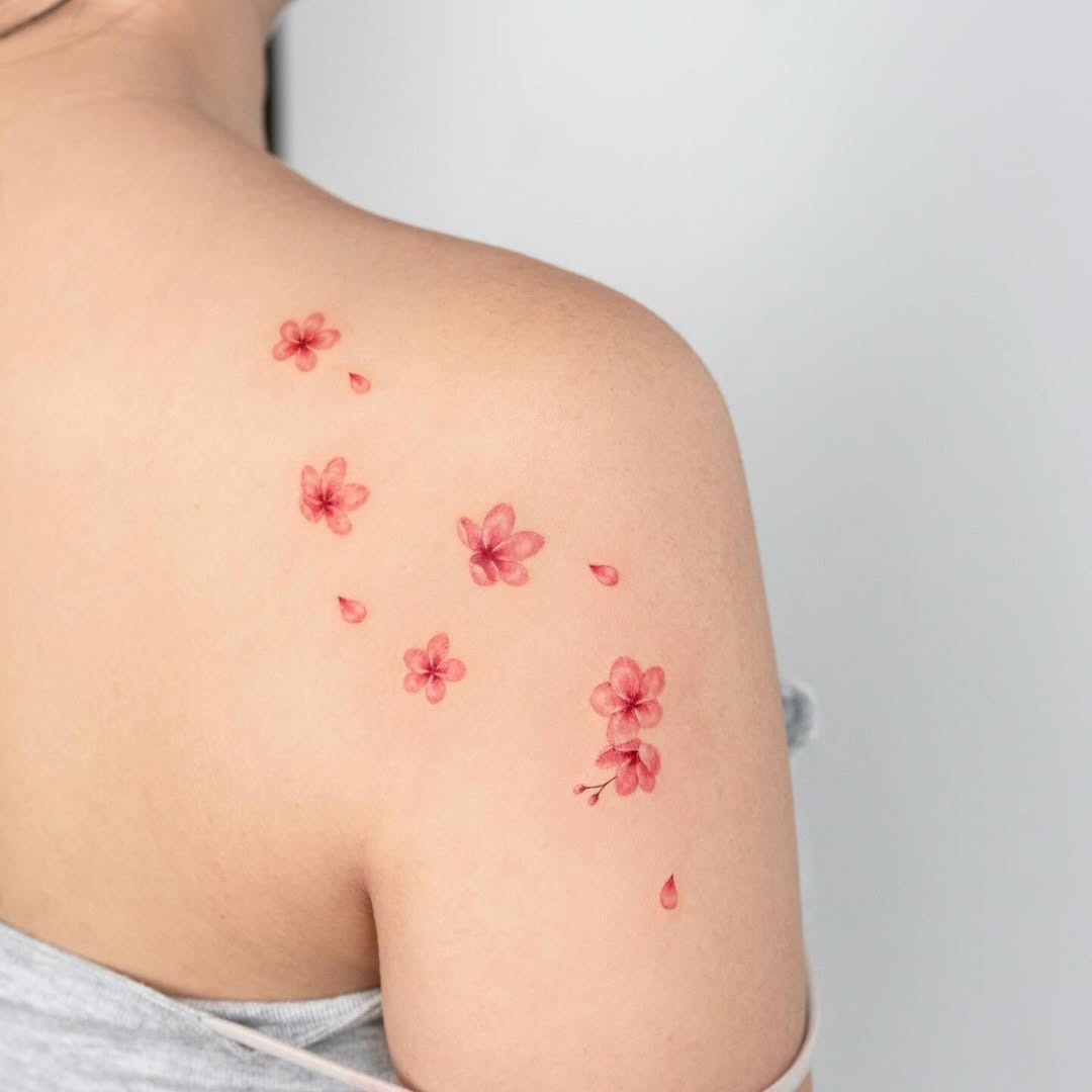 Delicate cherry blossom ink tattoo on shoulder Tattoo Design