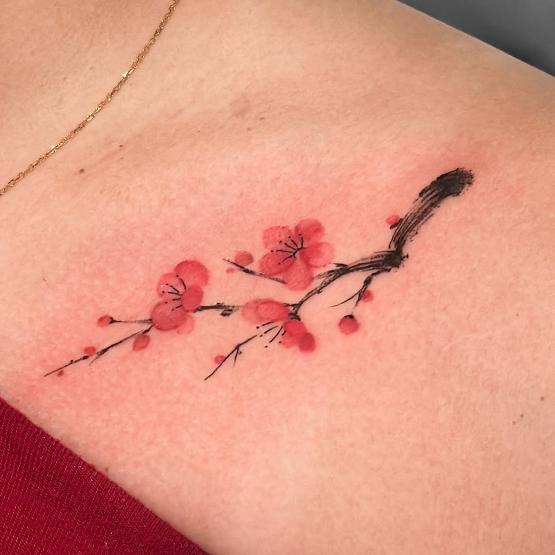 Delicate cherry blossoms on skin artistry Tattoo Design