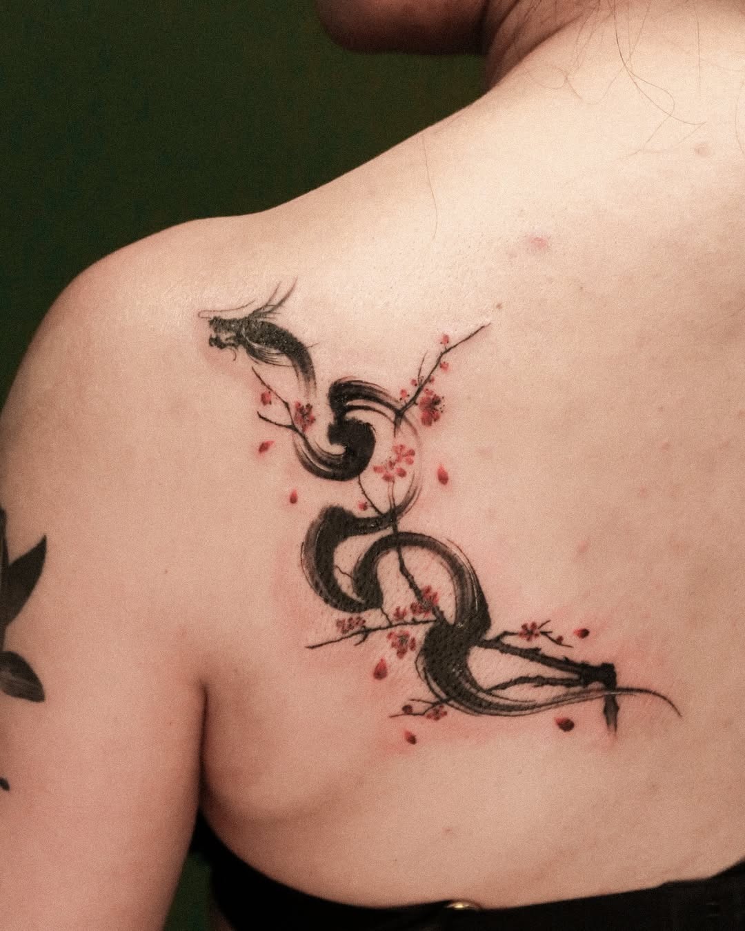 Elegant cherry blossom and dragon tattoo design Tattoo Design