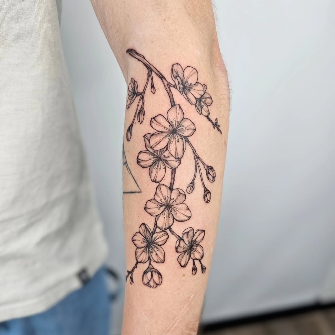 Elegant cherry blossom tattoo design inspiration Tattoo Design