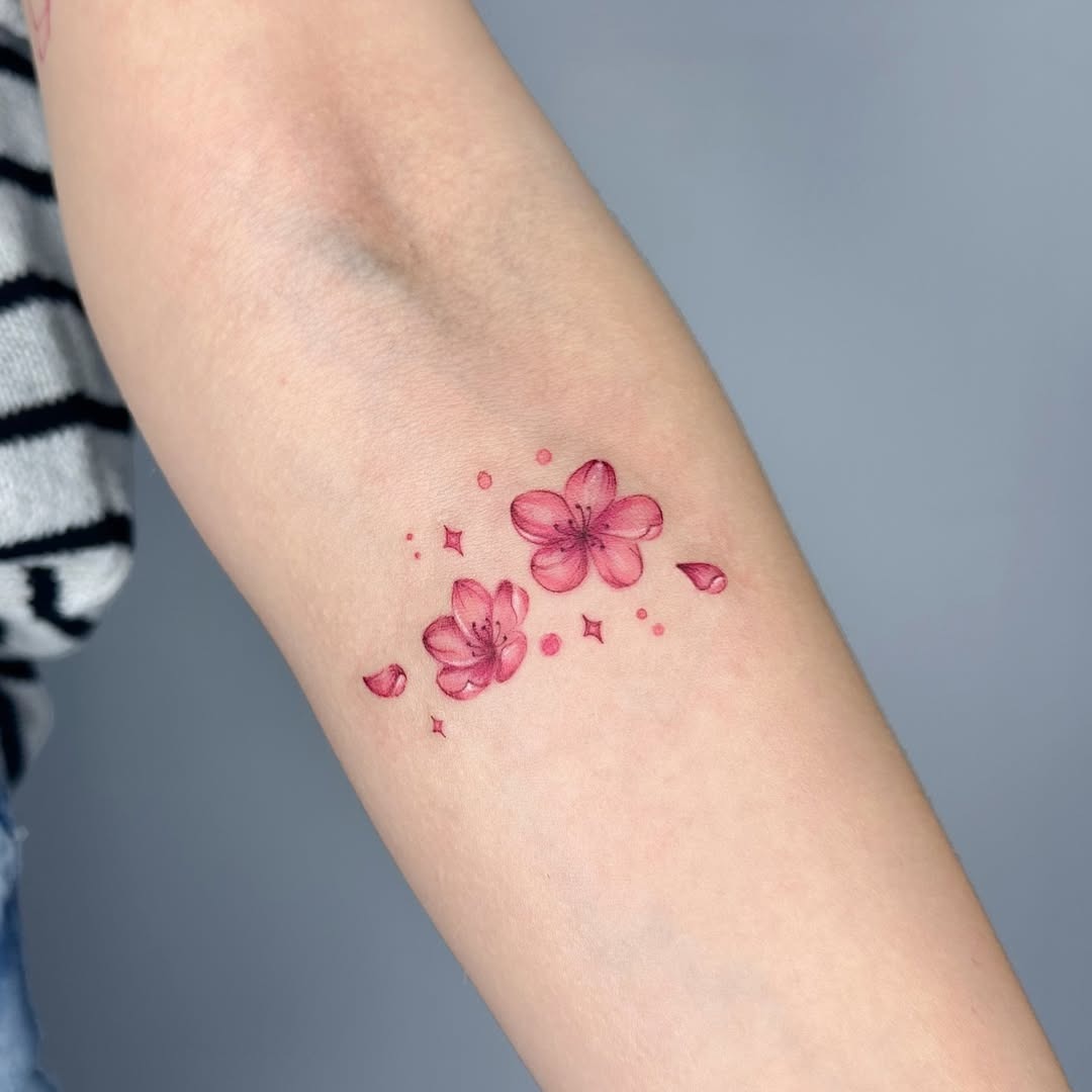Elegant cherry blossom tattoo showcasing delicate beauty Tattoo Design