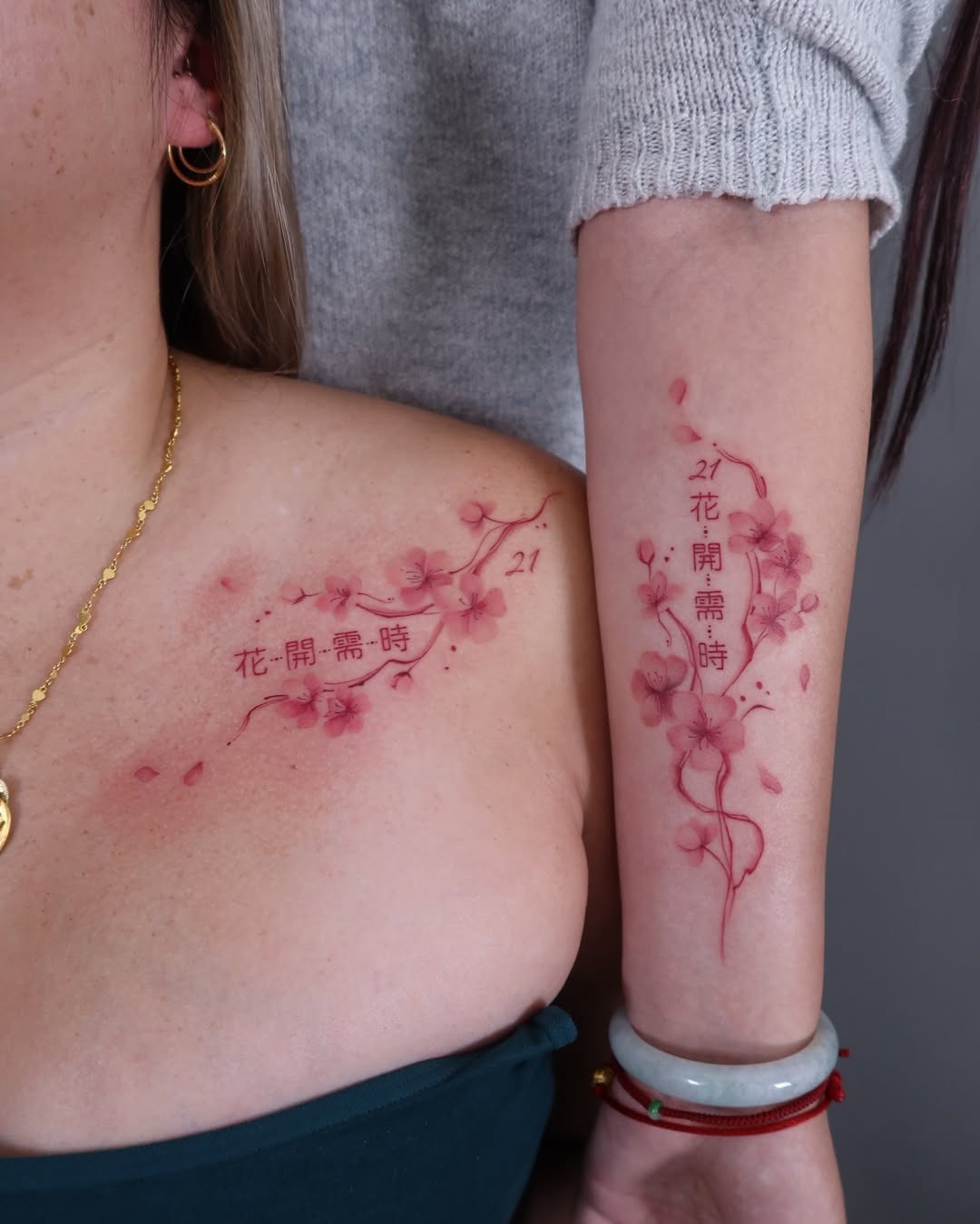 Elegant Cherry Blossom Tattoos with Meaningful Text Tattoo Design
