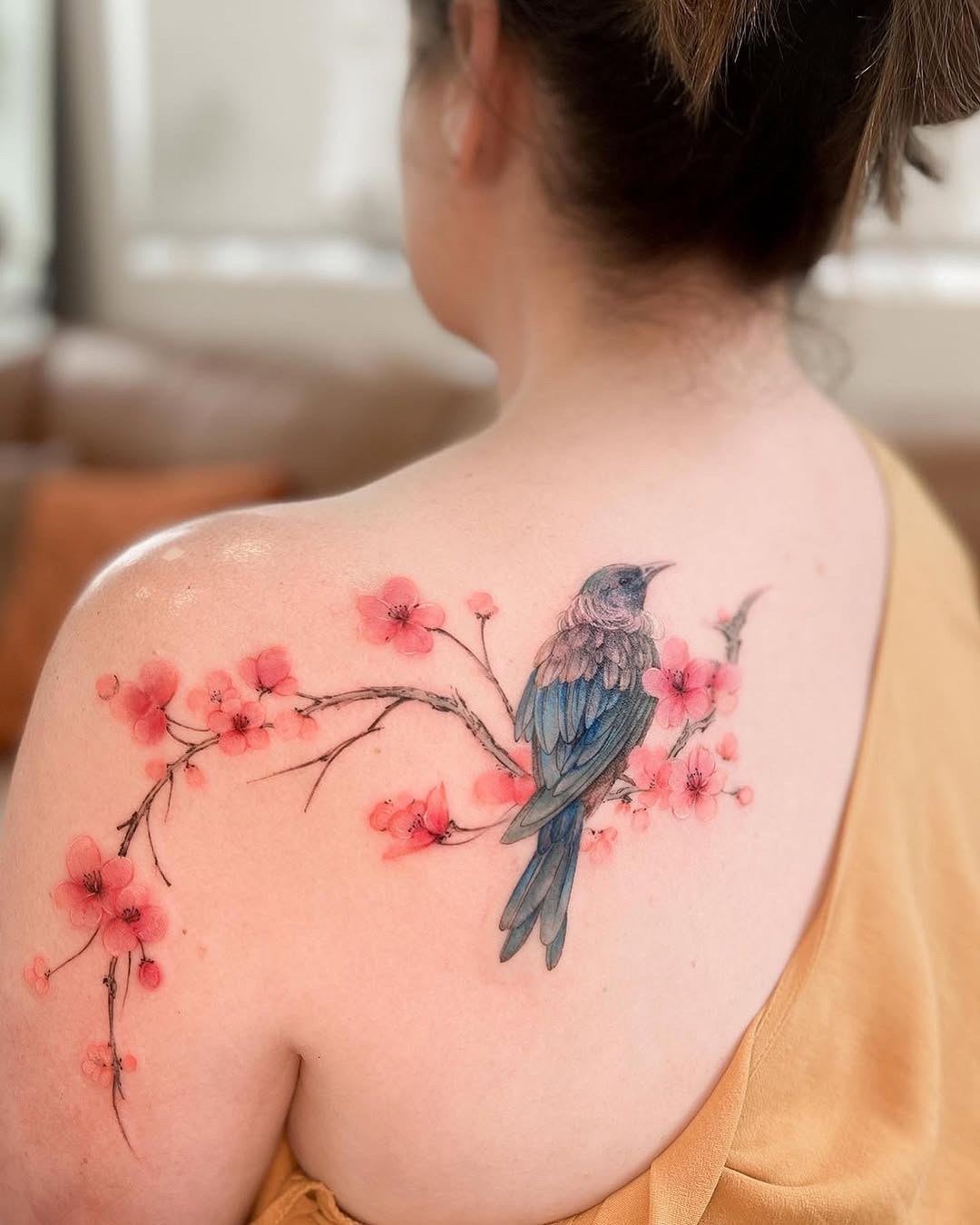 Stunning cherry blossom and bird tattoo fusion Tattoo Design