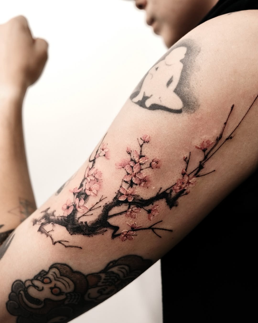 Stunning cherry blossom tattoo on the arm Tattoo Design
