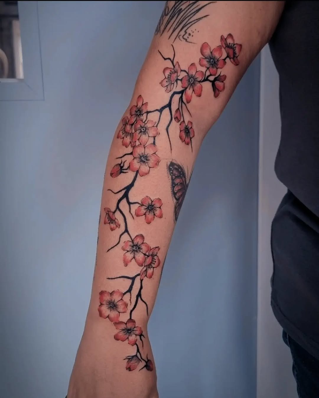 Stunning cherry blossom tattoo on the forearm Tattoo Design