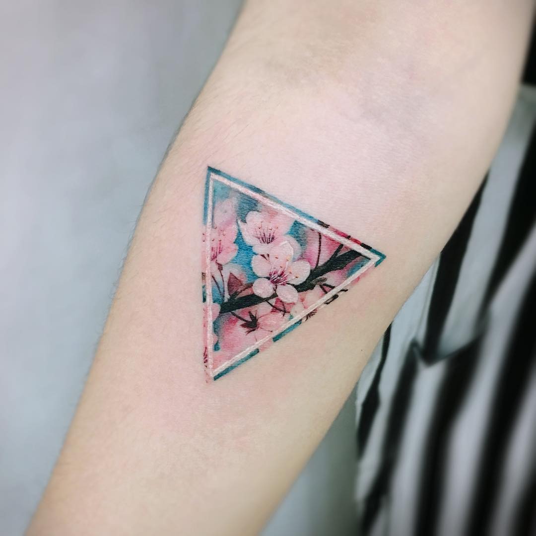 Stylish triangle cherry blossom tattoo design Tattoo Design