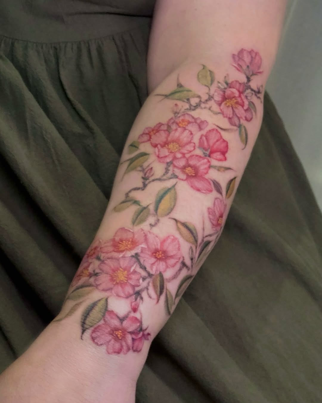 Vibrant Cherry Blossom Tattoo on Arm Tattoo Design