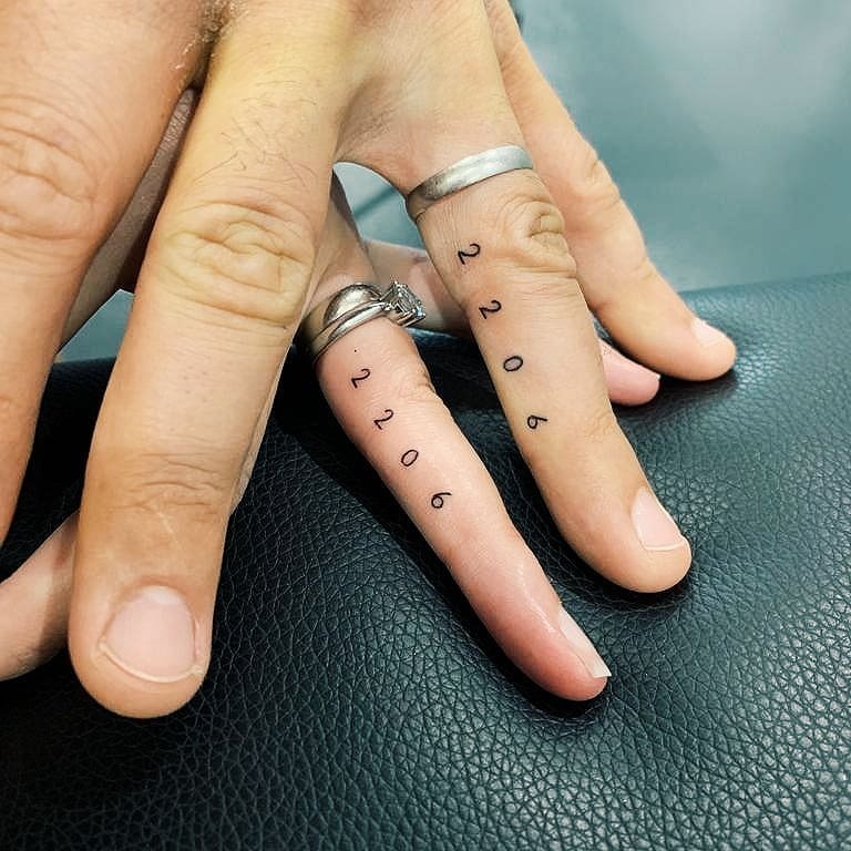 Roman Numeral Date with Child's Name Tattoo Tattoo Design