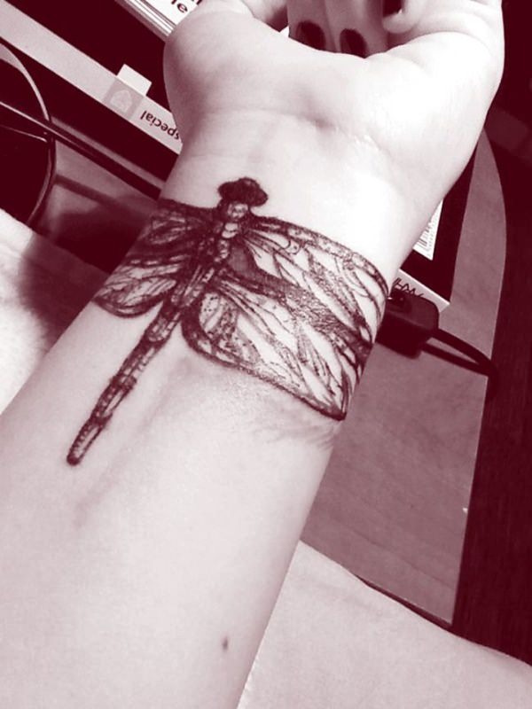 Minute-Sized Black Shaded Dragonfly Tattoo Idea Tattoo Design
