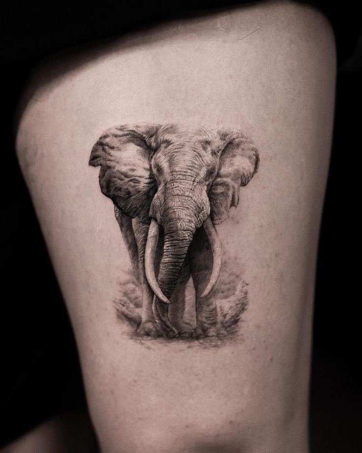 Black and Grey Elephant Thigh Tattoo Tattoo Design