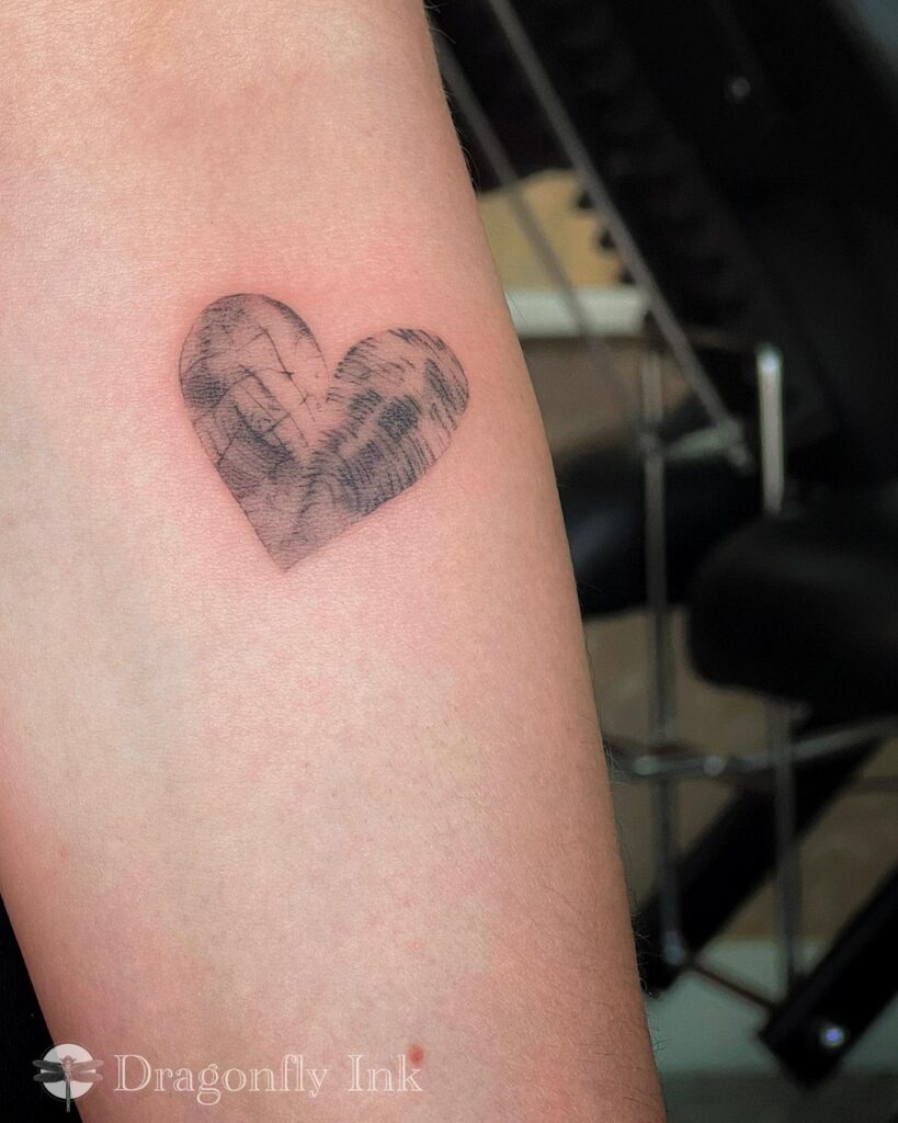 Single Fingerprint Tattoo with Name Tattoo Design
