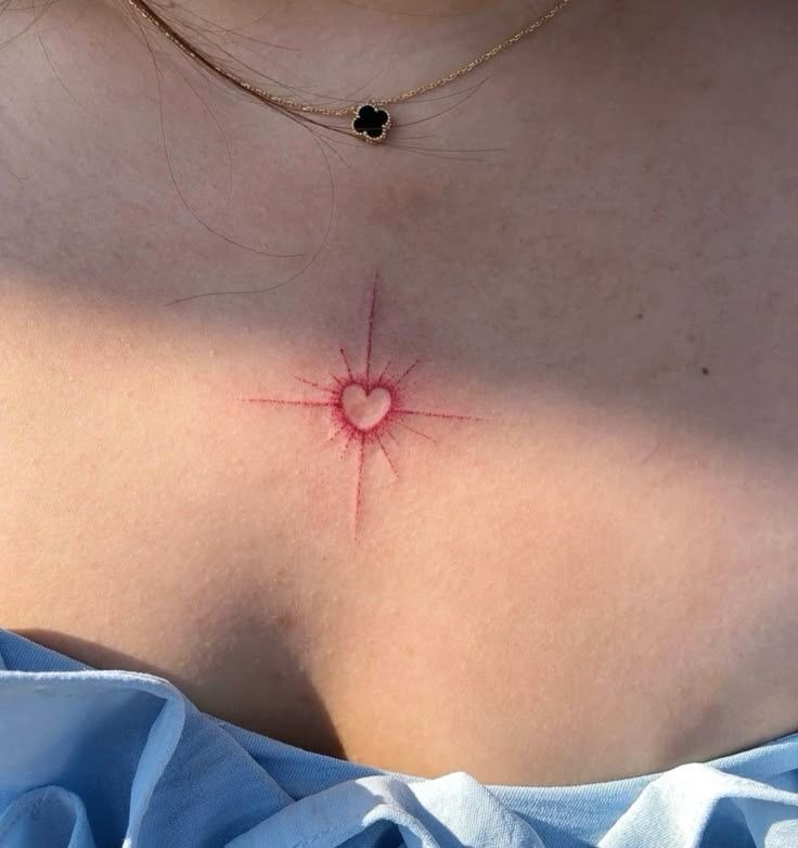 Radiant Red Chest Heart Tattoo Tattoo Design
