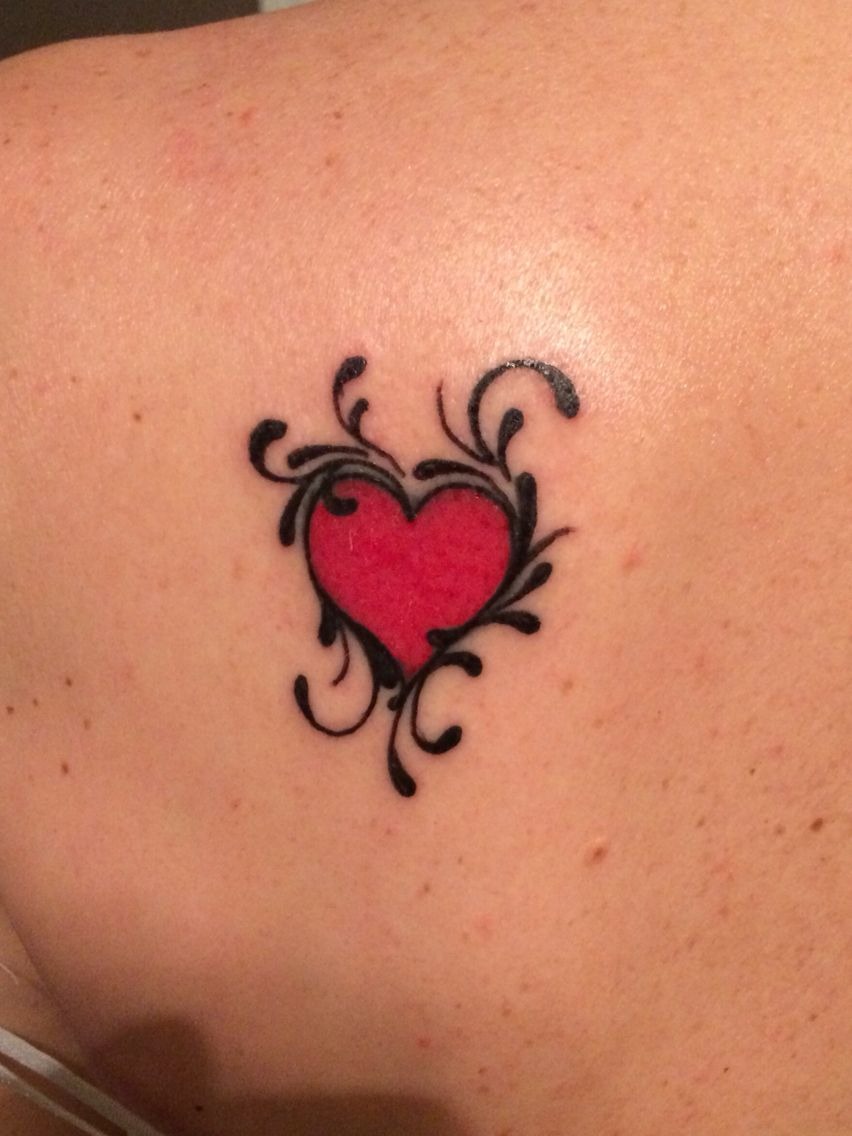 Red Heart With Black Flourishes Tattoo Design