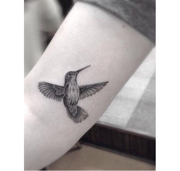 Delicately Detailed Hummingbird Tattoos Pointing to the Heart Tattoo Design