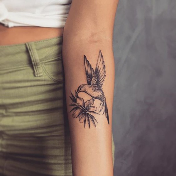 Graceful Hummingbird Tattoo with Tropical Flower Tattoo Design