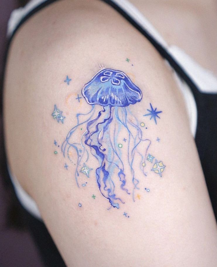 Delicate Blue Jellyfish With Tiny Stars Tattoo Design